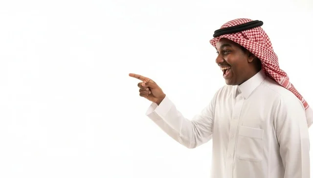 Smiling Saudi Man Pointing on White Background