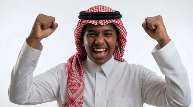 Excited Saudi Man Celebrating Victory on White Background