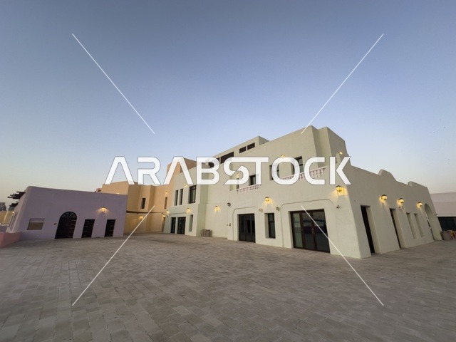 Old Doha Port Traditional Qatari Buildings at Dusk