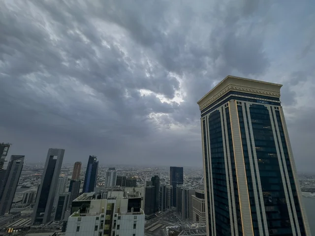 Doha West Bay Skyline Under Cloudy Sky
