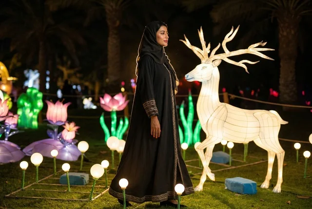 Arab Woman in Abaya at Night Light Festival Outdoor