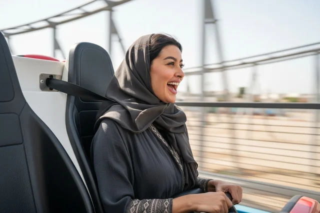 Saudi Woman Enjoying Roller Coaster Ride at Theme Park
