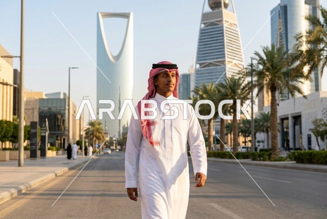 Saudi Man Walking on Riyadh Street with Skyline