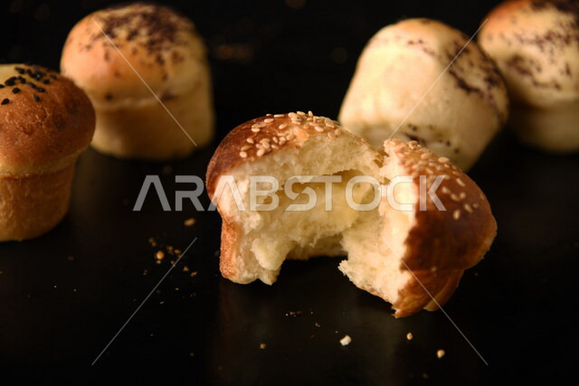 Variety of Delicious Hot Bakery, Fresh Popular Bakery, Bakery and Pastry, Stuffed Hollow Cake Discs, Delicious Food, Black Background