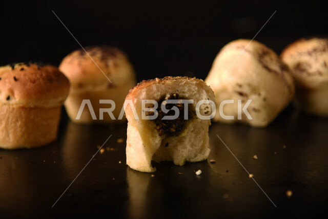 Variety of Delicious Hot Bakery, Fresh Popular Bakery, Bakery and Pastry, Stuffed Hollow Cake Discs, Delicious Food, Black Background