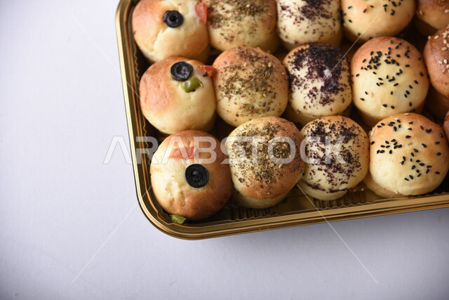 Variety of Delicious Hot Bakery, Fresh Popular Bakery, Bakery and Pastry, Stuffed Hollow Cake Discs, Delicious Food, White Background