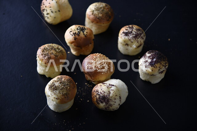 Variety of Delicious Hot Bakery, Fresh Popular Bakery, Bakery and Pastry, Stuffed Hollow Cake Discs, Delicious Food, Black Background