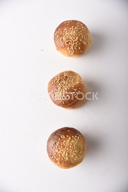 Variety of Delicious Hot Bakery, Fresh Popular Bakery, Bakery and Pastry, Stuffed Hollow Cake Discs, Delicious Food, White Background