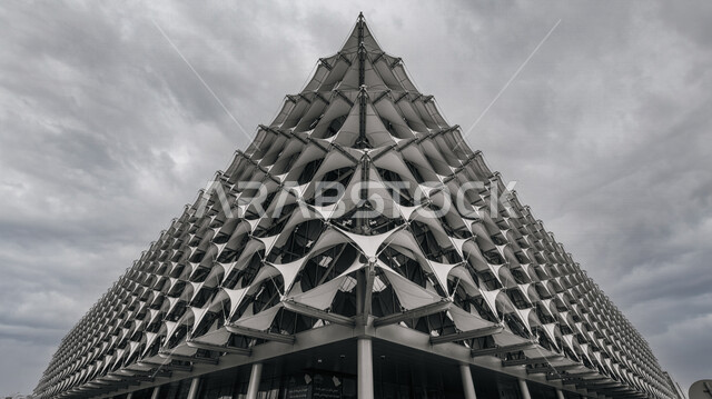 Creative image of King Fahd National Library in Riyadh, Saudi Arabia, architectural art, distinctive engineering designs, King Fahd Library, famous Riyadh landmarks, tourist attractions in Saudi Arabia