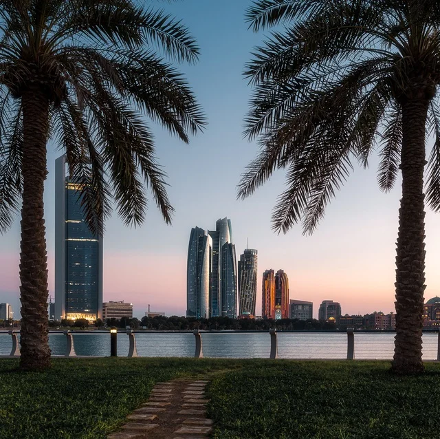 Abu Dhabi Skyline with Etihad Towers and Palm Trees
