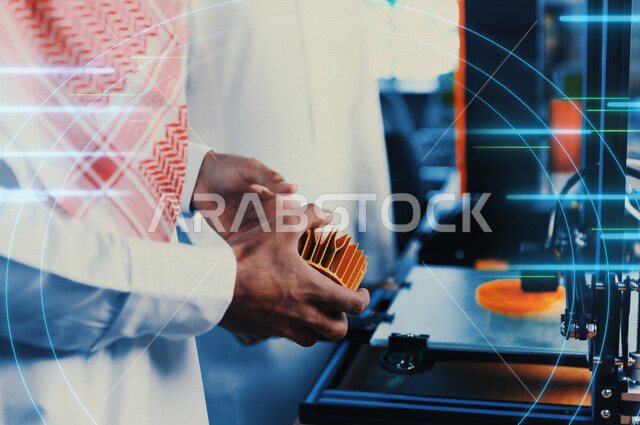 صورة مقربة لشاب عربي خليجي سعودي مبتكر،اختراعات وصناعات هندسية ، التطور الصناعي ، رؤية مستقبلية ، خلفية لخطوط هولوجرامية ثلاثية الابعاد