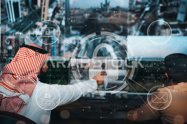 رجل عربي خليجي سعودي يشير بيده الى شاشة الحاسوب ، تطوير برامج قفل الشاشة ، الدخول الامن للبيانات ،  برامج حماية البيانات والمعلومات ، الامن السيبراني ، خلفية للقفل وايقونات التطبيقات