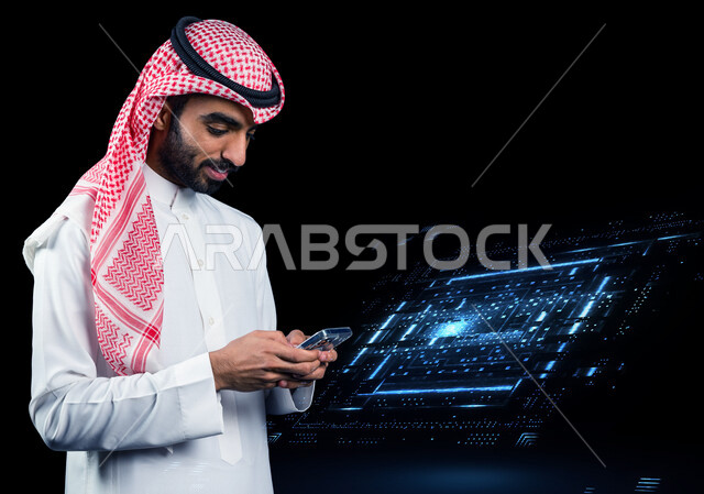 رجل عربي سعودي خليجي، يستخدم الهاتف المحمول، التسوق الإلكتروني، إستخدام أجهزة تقنية حديثة، إدارة الأعمال عن بعد، العمل عن بعد ، إستخدام تقنية الهولوجرام ثلاثية الأبعاد