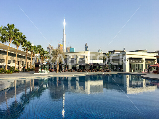 Creative image of Burj Khalifa in Dubai, United Arab Emirates, reflection of Burj Khalifa in a swimming pool, architectural art, famous Emirates landmarks, tourism in the Emirates