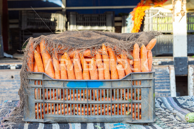 Close-up of a box full of carrots, a group of carrots, fresh vegetables, vegetable market, popular vegetable markets