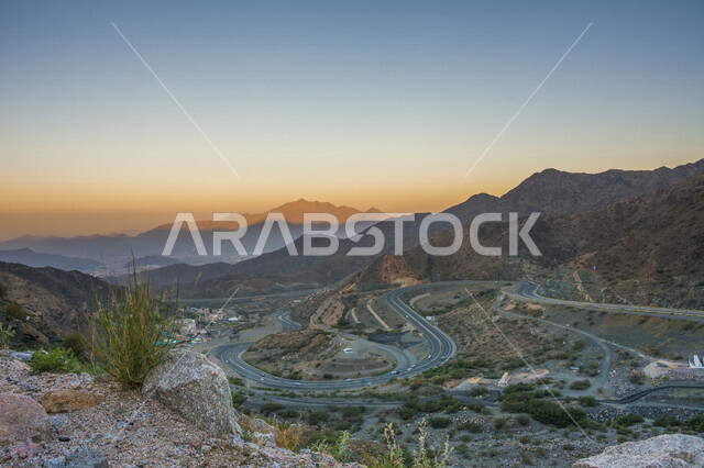 Aesthetic image of sunset on the Hada Mountains in the city of Taif, a mountain pass located in the city of Taif, beautiful natural tourist attractions in the Kingdom of Saudi Arabia