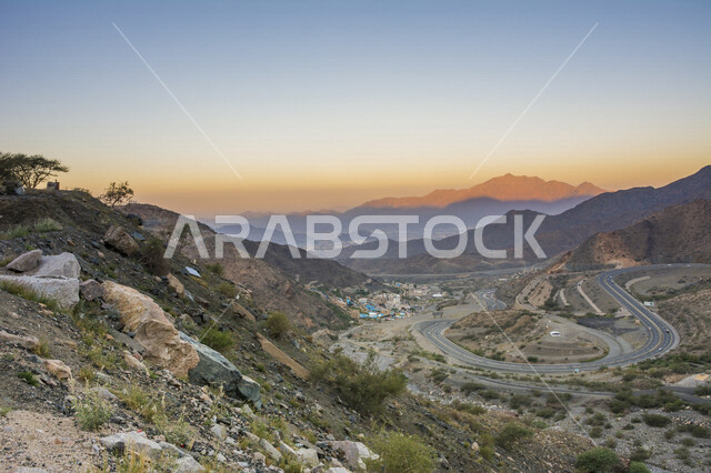 Aesthetic image of sunset on the Hada Mountains in the city of Taif, a mountain pass located in the city of Taif, beautiful natural tourist attractions in the Kingdom of Saudi Arabia