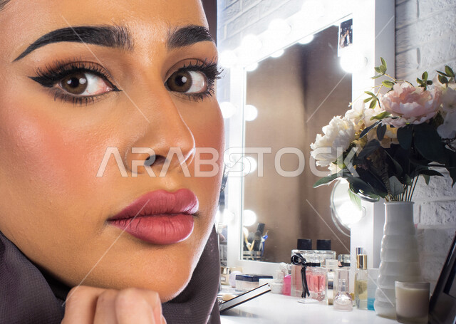 Close-up of the face of a veiled Saudi Arabian Gulf woman for a commercial advertisement for skin cosmetics, a woman expert in cosmetics, marketing of cosmetics and cosmetic products, a cosmetics store, the concept of beauty and skin care, a women's beaut