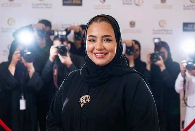 Saudi Woman in Black Abaya on Red Carpet Press Event