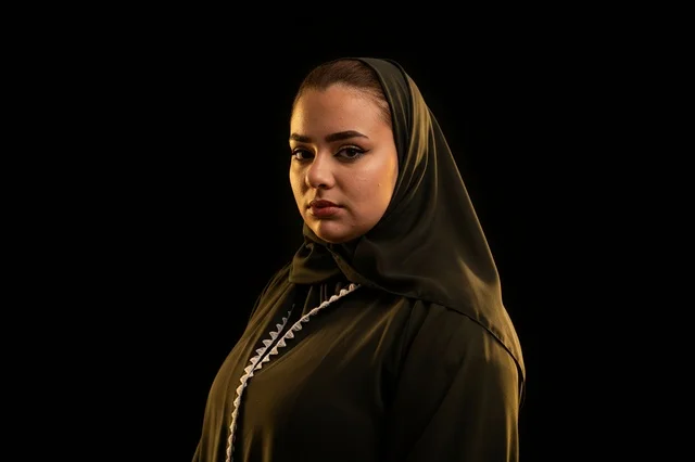 Saudi Arabian Woman in Black Hijab and Abaya Studio Portrait