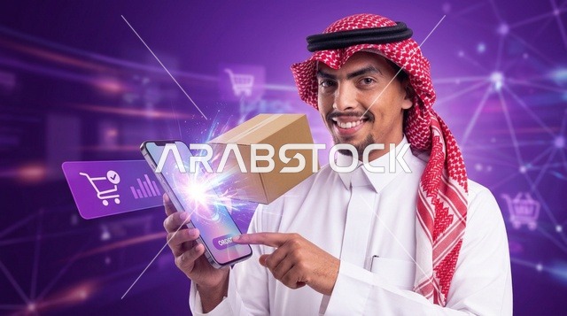 رجل سعودي يستخدم الهاتف الذكي للتسوق الإلكتروني