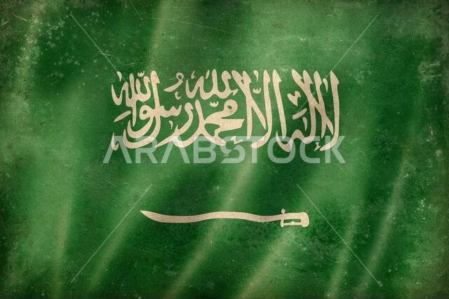 Old waving Saudi flag, worn, stained, and crumpled. Textured canva background