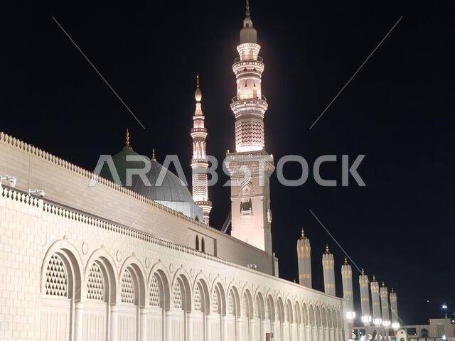 Al-Masjid an-Nabawi Night View: Beautiful Night Shot of the Green Dome and Minarets in Medina, Saudi Arabia.
