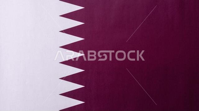 قطر، والعلم القطري رمزاً للاستقلال الوطني. العلم القطري كخلفية لتصميمك.