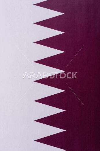 Qatar, the Qatari flag as a symbol of national independence. The Qatari flag as a background for your design.