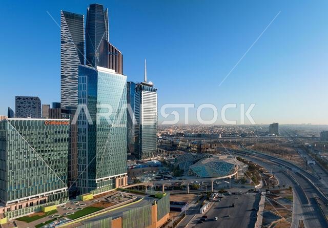 Daytime view of King Abdullah Financial District in Riyadh, Saudi Arabia, featuring modern skyscrapers and contemporary urban architecture. Daytime view of King Abdullah Financial District in Riyadh, Saudi Arabia, featuring modern skyscrapers and contemporary urban architecture.