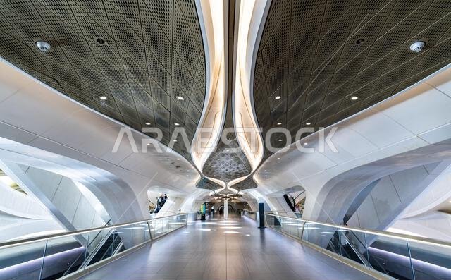 Riyadh, Saudi Arabia - February 19, 2026: Futuristic interior architecture and pedestrian bridge of the King Abdullah Financial District (KAFD) Metro Station