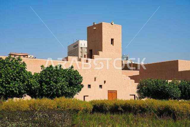 Traditional mud brick architecture of Al-Hilla Mosque in Al Quraa Alley, Al Dho historical district, Riyadh, Saudi Arabia