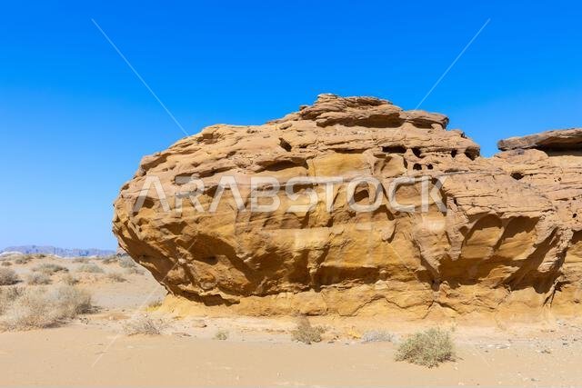 Jabal AlAhmar, a Nabataean sanctuary with rock-cut tombs from the 1st and 2nd centuries CE, located in the ancient city of Hegra, Saudi Arabia Jabal AlAhmar, a Nabataean sanctuary with rock-cut tombs from the 1st and 2nd centuries CE, located in the ancient city of Hegra, Saudi Arabia
