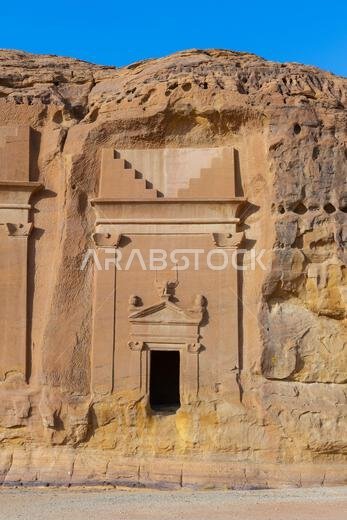 Close-up of a rock-cut tomb at Jabal al-Banat (Mountain of the Women) at the Nabataean archaeological site of Hegra near UlUla, Saudi Arabia