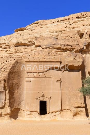 Close-up of a rock-cut tomb at Jabal al-Banat (Mountain of the Women) at the Nabataean archaeological site of Hegra near UlUla, Saudi Arabia