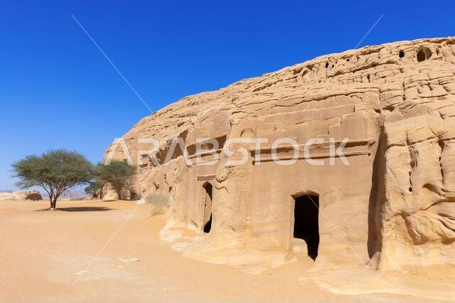 Rock-cut tombs at Jabal al-Banat (Mountain of the Women) at the Nabataean archaeological site of Hegra near Ul Ula, Saudi Arabia