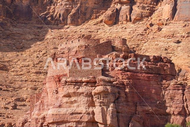 AlUla Castle towering over the mudbrick houses of the Old Town in Saudi Arabia