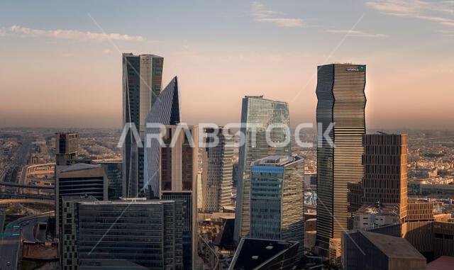 Daytime view of King Abdullah Financial District in Riyadh, Saudi Arabia, featuring modern skyscrapers and contemporary urban architecture. Daytime view of King Abdullah Financial District in Riyadh, Saudi Arabia, featuring modern skyscrapers and contemporary urban architecture.
