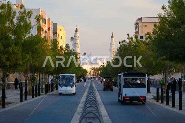 Perspective view of the historic Quba Mosque at the end of the pedestrian Quba Avenue in Madinah, Saudi Arabia
