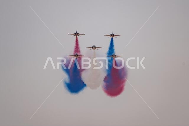 Riyadh, Saudi Arabia - 10 2 2026: jets flying with colored smoke