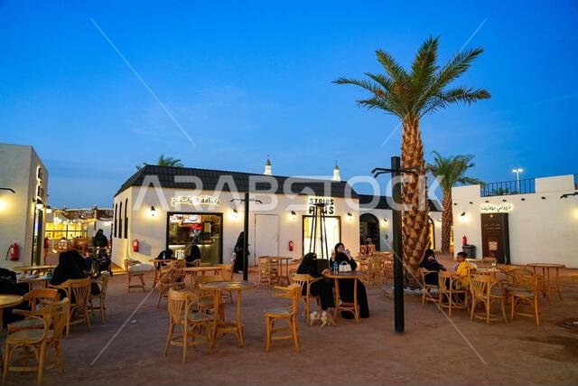 Modern restaurant illuminated at blue hour near Quba Mosque in the holy city of Madinah, Saudi Arabia