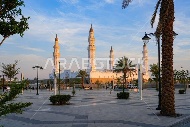 Historic white Quba Mosque and its four minarets as seen from the public Qubaa Square in Madinah, Saudi Arabia