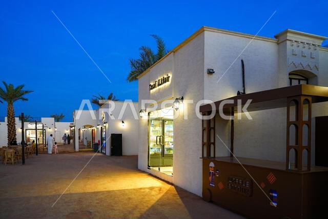 Modern restaurant illuminated at blue hour near Quba Mosque in the holy city of Madinah, Saudi Arabia