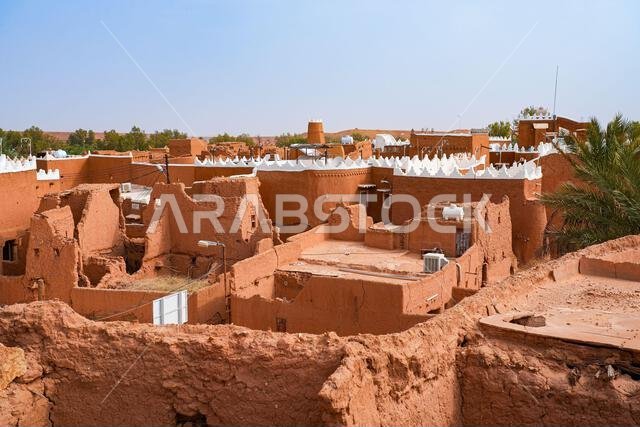 Aerial view of the rooftops of the mud brick houses of the heritage village of Ushaiqer, Saudi Arabia