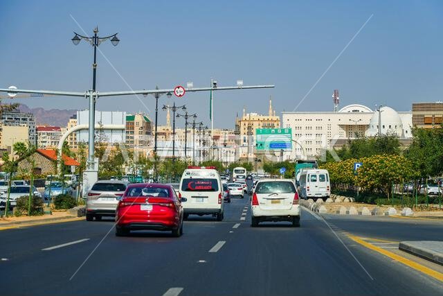 Traffic on the avenue heading towards the historic Al Anbariya Masjid in Madinah, Saudi Arabia