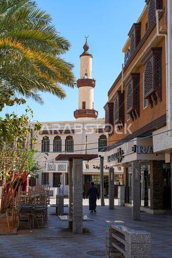 Public square overlooked by a minaret in Al Balad historic center of Taif in Saudi Arabia