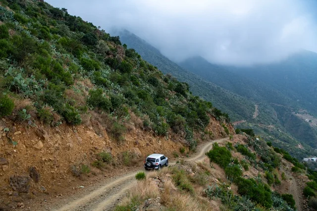 SUV Driving on Dirt Mountain Road in Asir Saudi Arabia