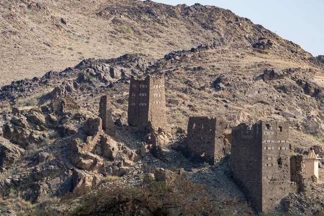 Ancient Stone Fortress Ruins on Rocky Mountain Slope