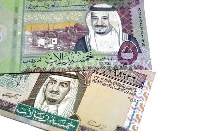 obverse sides of old and new 5 SAR five Saudi Arabian riyals cash money banknote bill, features a portrait of king Fahd and King Salman Bin AbdulAziz