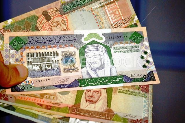 أوراق نقدية قديمة من الريال السعودي (SAR)، بقيم مختلفة، تعود إلى عهد الملك فهد بن عبد العزيز آل سعود، المملكة العربية السعودية